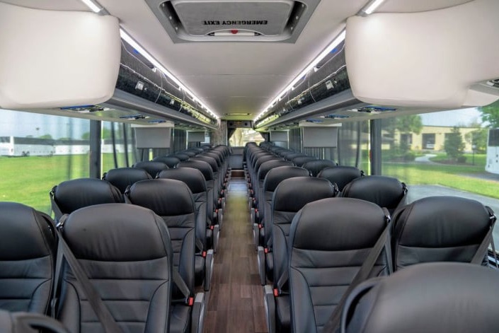 Charter bus interior with reclining seats