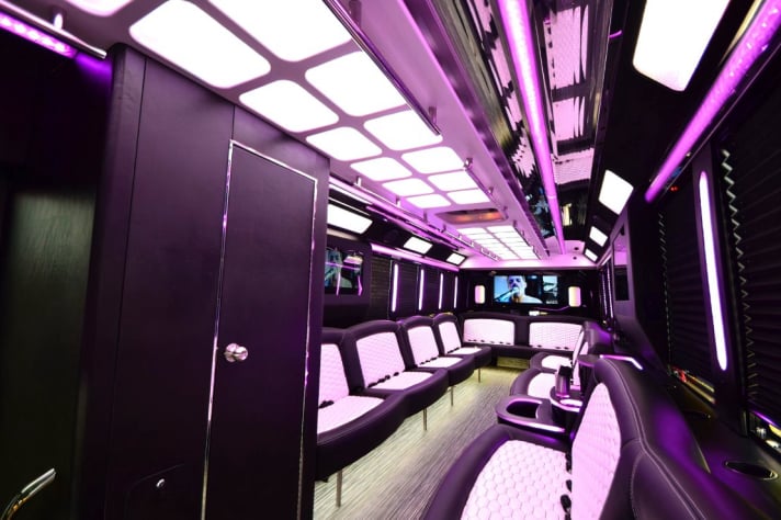 Party bus lounge seating and bar area